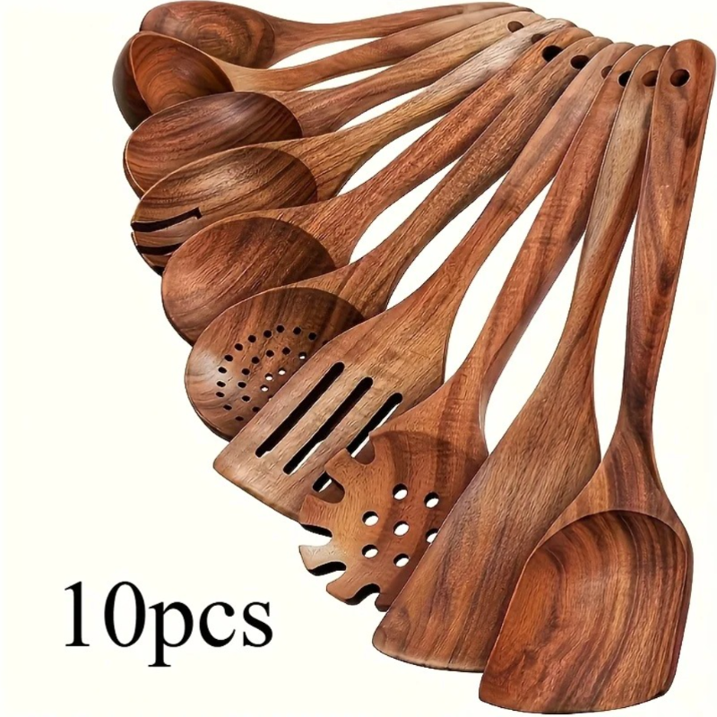 Set of 10 wooden cooking utensils on a white background