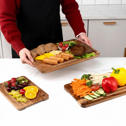 Person holding a acacia wooden tray with food on a kitchen counter