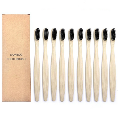 Set of bamboo toothbrushes with black bristles and a cardboard box labeled 'Bamboo Toothbrush' on a white background.