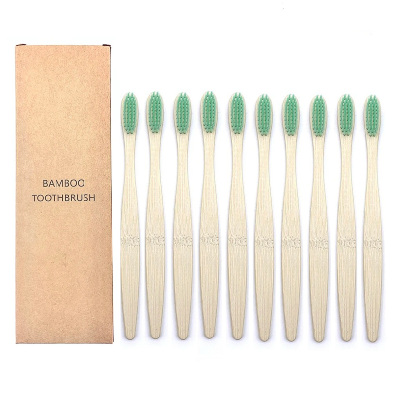Set of bamboo toothbrushes with green bristles and a cardboard box labeled 'Bamboo Toothbrush' on a white background.