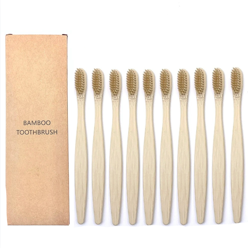 Set of bamboo toothbrushes Light Brown with a cardboard box on a white background