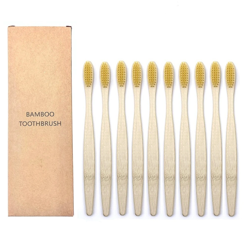 Set of bamboo toothbrushes Yellow color with a cardboard box labeled 'Bamboo Toothbrush' on a white background.