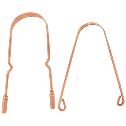 Pure copper tongue scraper with natural copper finish showing ergonomic handle and wide scraping head, natural antimicrobial oral hygiene tool.
