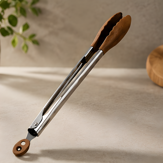 Walnut wood stainless steel kitchen tongs on a light background