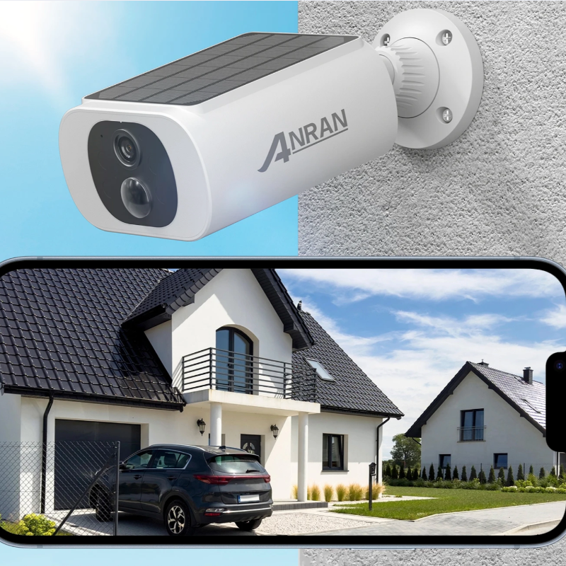 Solar security camera on a wall with a house and car in the image on the phone